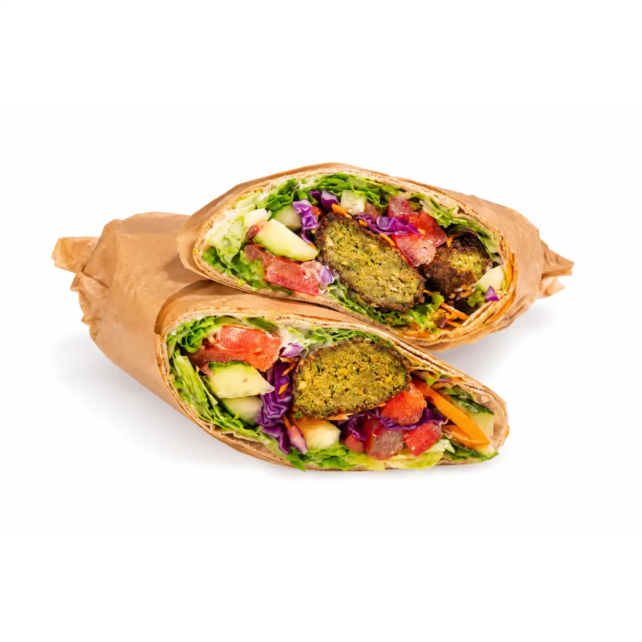 Hummus cremos, falafel copt și legume crocante, cu sos de iaurt și ierburi, în lipie integrală.